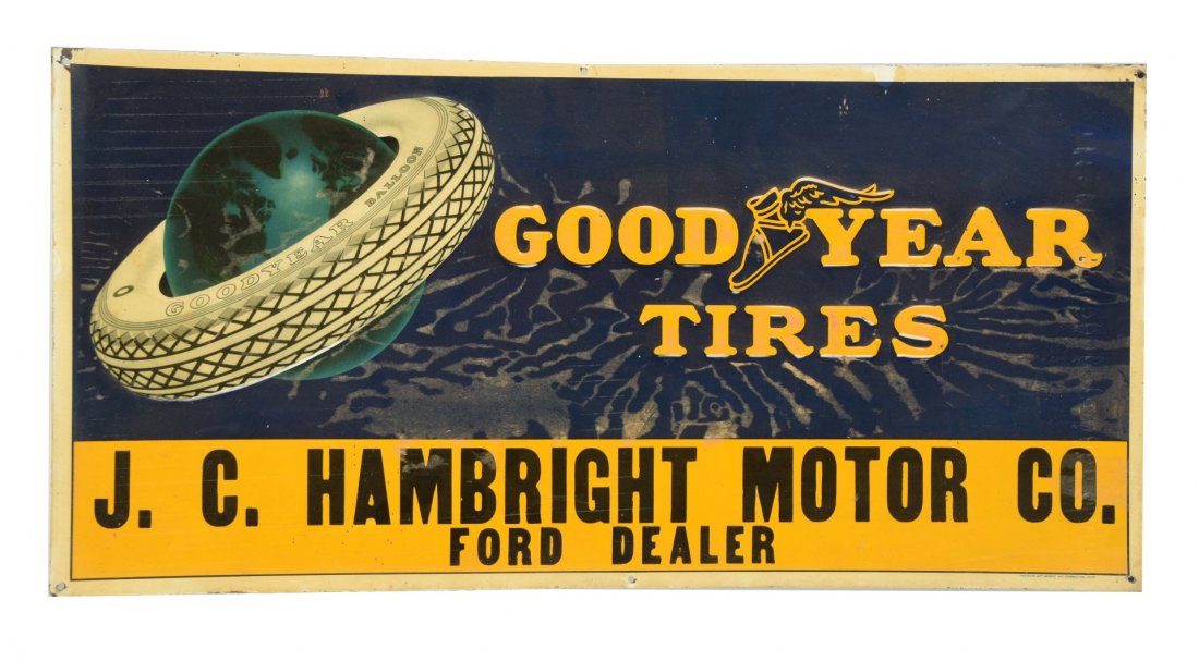 Goodyear Tires w/ World in Tire Logo Tin Sign. (1 of 1)