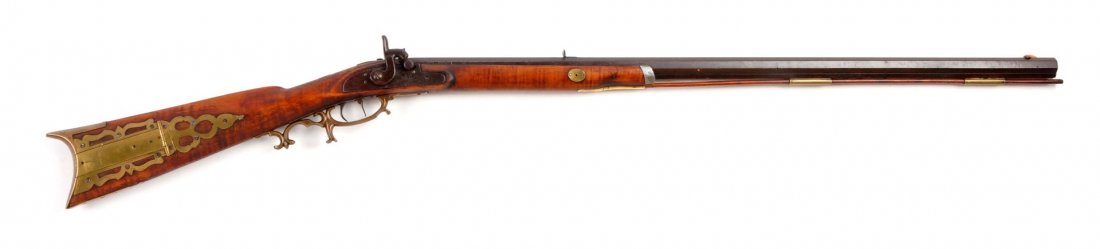 (A) Half Stock Percussion Rifle.: Serial # NSN Octagon 33-1/4” unmarked barrel in .32 caliber rifled bore. Flat lock plate stamped “LEHMAN/LANCASTER, PA”. Four-piece pierced patch box opens by hand at butt plate. Engraved brass 