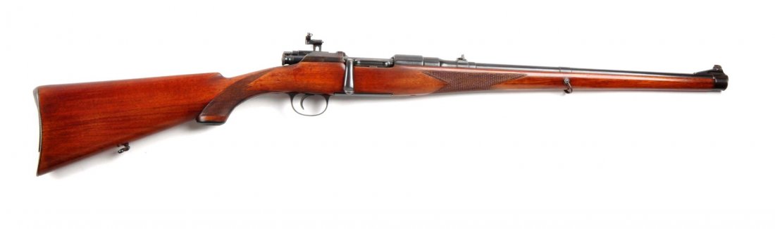 (C) Mannlicher Schoenauer Model 1903 Rifle.: Serial # 23720 19-3/4” barrel in 6.5x54 mm caliber. This is the first of the true full-stock Mannlicher rifles. Features single trigger. Made in Austria. Receiver bridge is stamped “M1903”. Has 