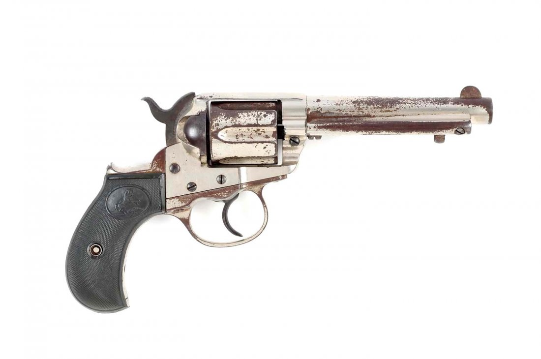 (A) Colt Model 1877 Lightning Revolver.: Serial # 62785 4-1/2" barrel in .38 LC caliber. Manufactured 1888. Standard six shot double action revolver with nickel finish and black composite Colt grips. Strong two-line legend on barrel. Strong 