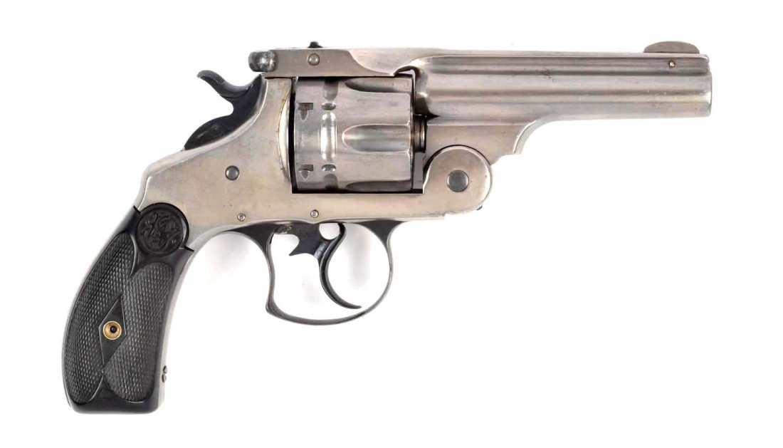 (A) S&W New Model No. 3 Double Action Revolver.: Serial # 2854 4" barrel in .44-40 caliber. The Smith & Wesson No. 3 double action is officially referred to as the Navy Model. This model was introduced in 1881 and all frames were manufactured prior