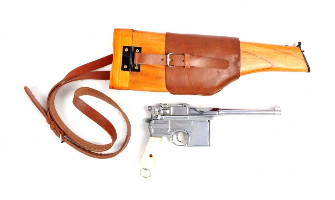 (C) Custom Nickel Mauser C-96 Broomhandle Pistol.: Serial # 446925 5-1/2" barrel in .30 caliber. Standard commercial Model Broomhandle. Left side of frame stamped "Germany". Top of barrel has the Mauser stamp. Matching serial number on barrel, firing 