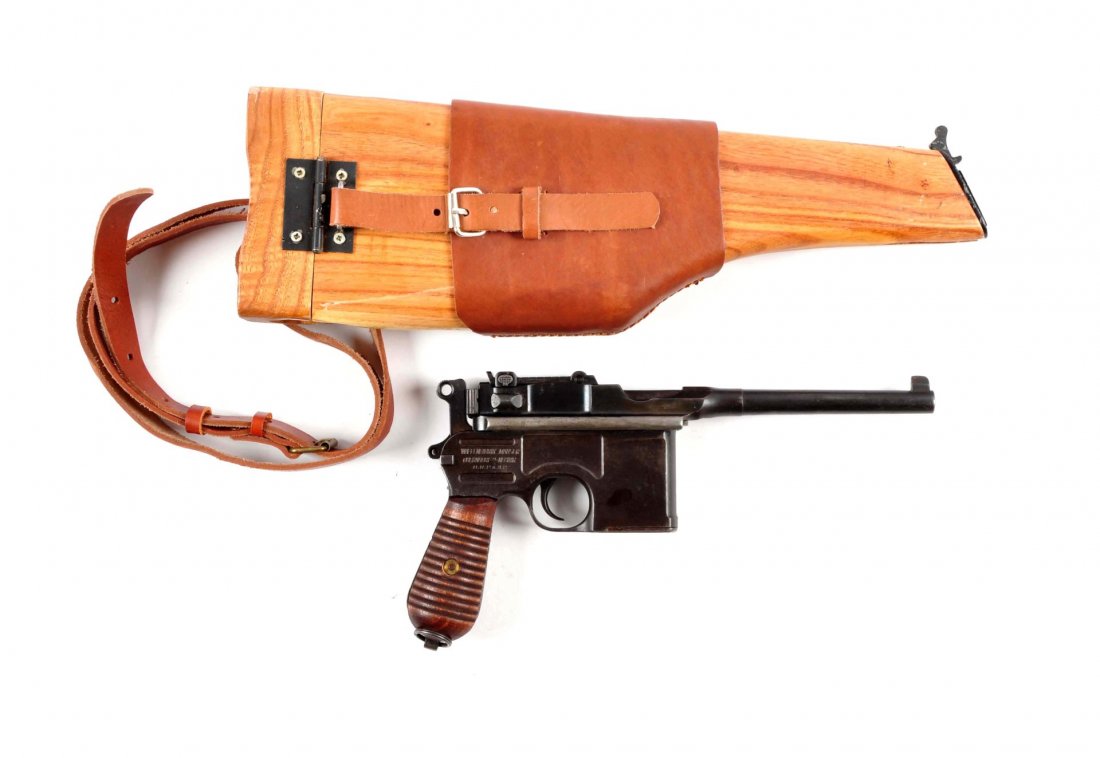 (C) Chinese Broomhandle Mauser Model C-96: Serial # 902576 Serial # 902576 Barrel length 5-1/2", .30 Mauser. Not technically a Chinese Broomhandle in that this pistol was manufactured at the Mauser factory in Germany. It has the German imperia