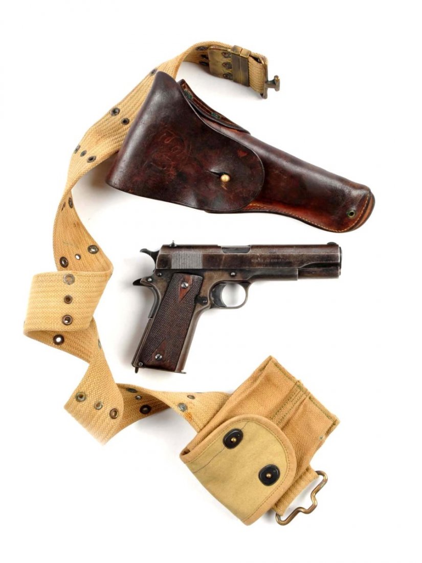 (C) Savage/Colt U.S. Model 1911 Semi-Auto Pistol.: Serial # 317399 5" barrel in .45 ACP. The frame of this pistol was manufactured by Colt in 1918 and the left side of frame bears the eagle head S14 inspector stamp. The slide was manufactured A.J. Sav