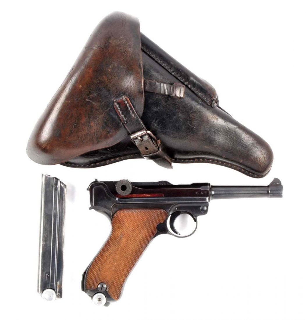 (C) 1934 Code byf Luger.: Serial # 280 4" barrel in 9mm caliber. Manufactured by Mauser for the German military, byf was assigned to Mauser. This is stamped 41 above chamber. Standard configuration, blued finish and checkered 