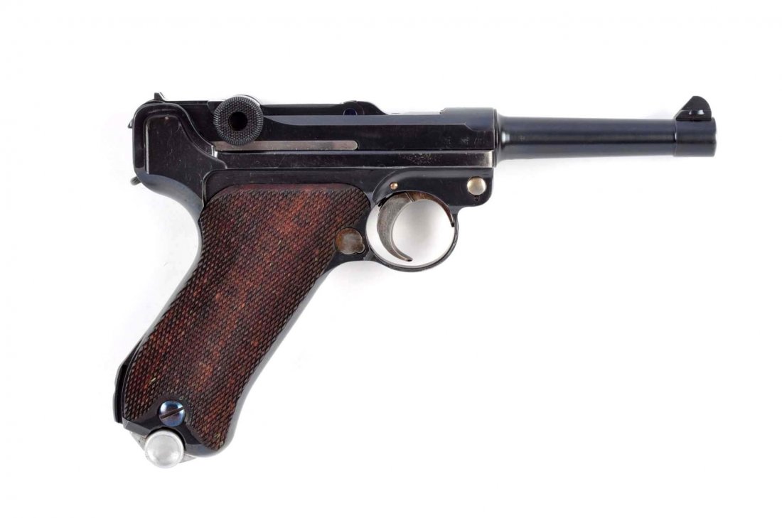 (C) S/42 G Date Luger (1935).: Serial # 5255 4" barrel in 9mm caliber. This is an extremely high condition Mauser Luger manufactured for the German military with the "G" signifying year of manufacture as 1935. The "G" is stamped ab