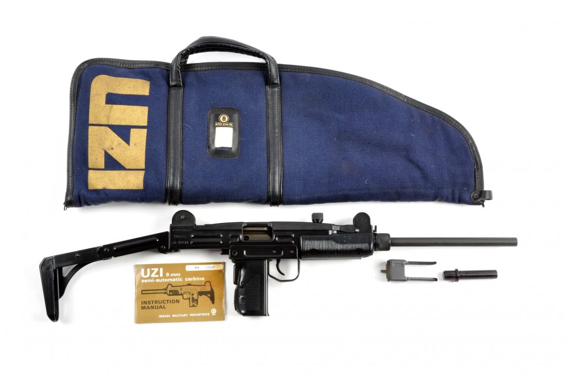 (M) UZI IMI Action Arms Pre-Ban Semi-Auto Carbine.: Serial # SA32461 Caliber 9mm Parabellum with a 16.1" barrel. The UZI semi-automatic carbine is a light weight, magazine feed firearm with a folding rear stock for shoulder firing. It is blowback opera