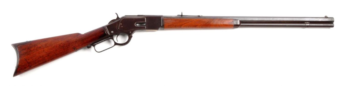 (A) Winchester Model 1873 Lever Action Rifle.: Serial # 116954 24" barrel in .44-40 caliber. Manufactured 1883. Standard rifle in popular .44-40 caliber. Features full octagon barrel, full magazine, original Winchester sporting sights, blued finis