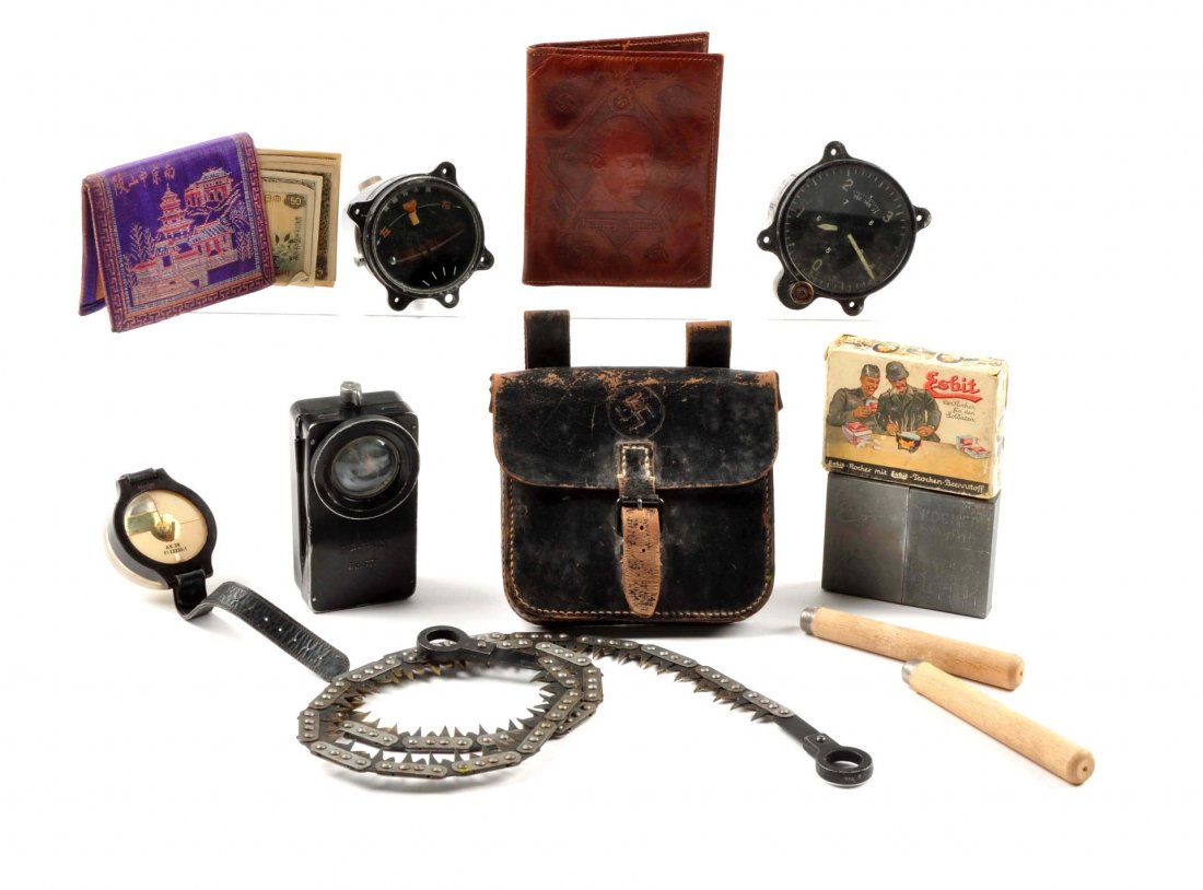 WWII German Nazi/Japanese Memorabilia Lot.: To include: swastika marked leather pouch with two-handled handheld saw, a boxed portable stove with German soldiers on cover, an interesting Nazi document wallet with Adolph Hitler and swastikas, a w