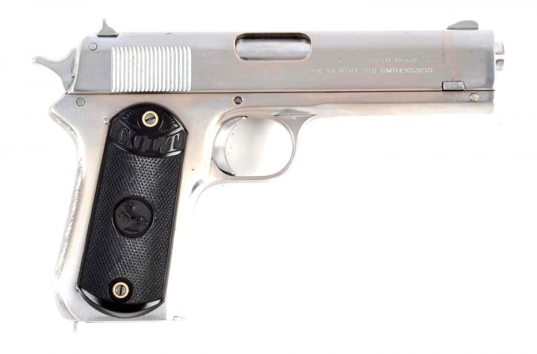 (C) Colt Model 1903 Pocket Hammer Pistol.: Serial # 22687 4" barrel in .38 Auto caliber. Manufactured in 1908. The pocket hammer model was designed by John Browning and is based on the model 1900. It is a semi-automatic, magazine fed pistol. P