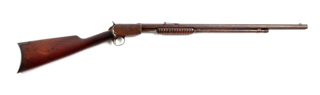 (C) Winchester Model 1890 Pump Rifle.: Serial # 151257 24" barrel in .22 short rimfire caliber. Manufactured in 1902. Features octagon barrel, 2/3 tube loading magazine, takedown, blued finish with grooved walnut forend, rifle walnut butts