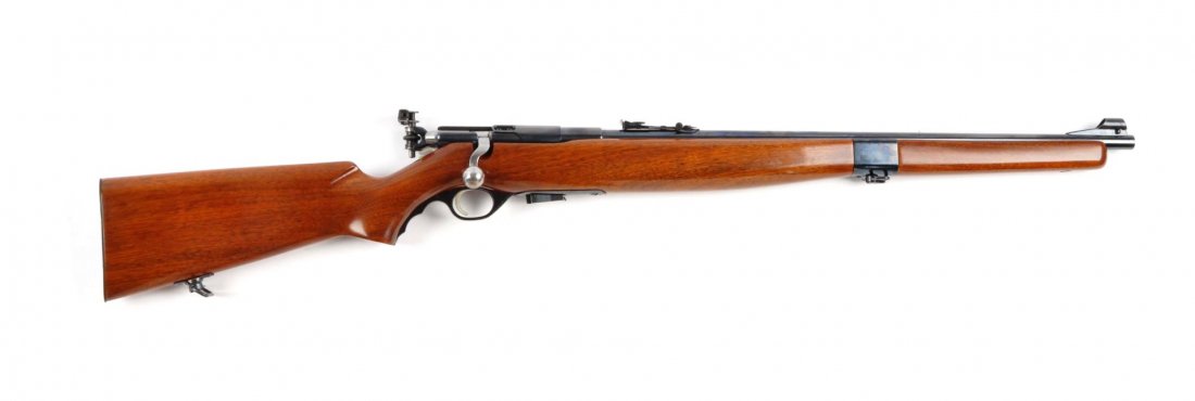 (C) Mossberg Model 42M Bolt Action Rifle.: Serial # NSN 23" barrel in .22 rimfire caliber. The Model 42M was manufactured from 1940 to 1944. It features a two piece full stock, bolt action, magazine fed, with ramp front sight, standard sportin