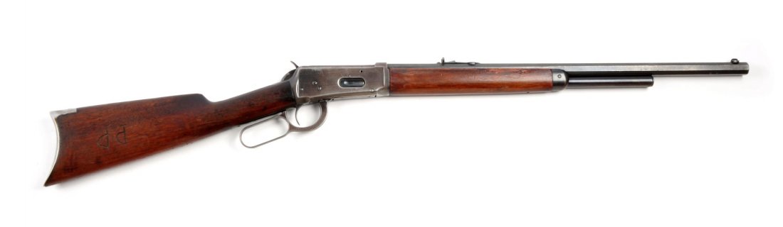 (C) Winchester Model 1894 Lever Action Rifle.: Serial # 152498 21-3/4" barrel in .30 WCF. Manufactured 1899. This rifle was period altered by shortening the full octagon barrel. Magazine was shortened to half length. Barrel was refinished and is n