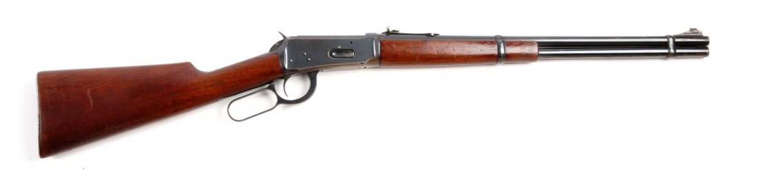 (C) Winchester Pre-64 Model 94 Carbine.: Serial # 1365412 20" barrel in .32 Winchester Special caliber. Manufactured 1942 to 1948. Standard carbine with a full round barrel, full magazine, two bands, ramp front sight, Winchester sporting rea
