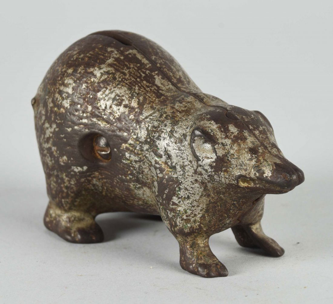 Cast Iron Possum Still Bank. (1 of 2)