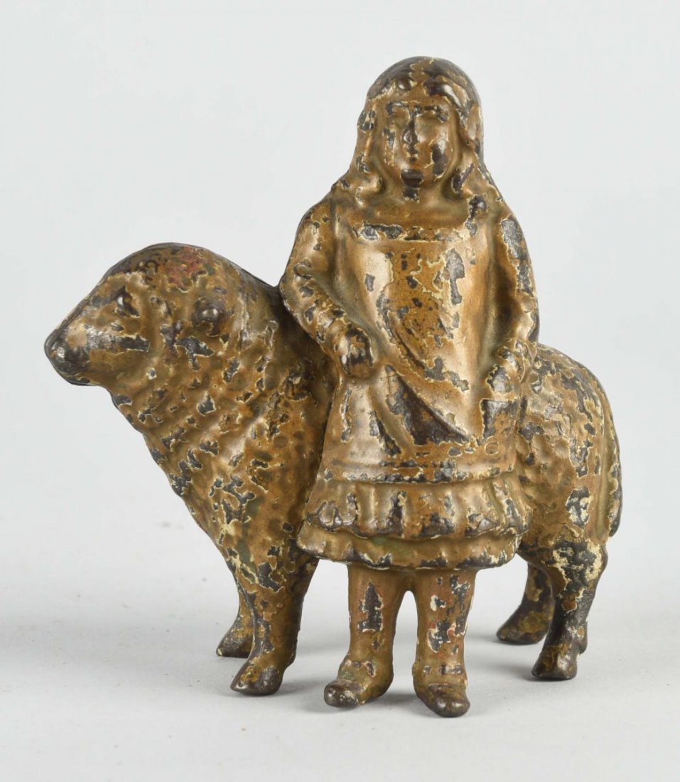 Cast Iron Mary & Lamb Still Bank.: Manufactured by A.C. Williams & Co. Condition (Very Good). Size 4-1/2'' T.