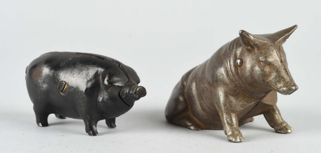Lot of 2: Cast Iron Pig Banks. (1 of 1)