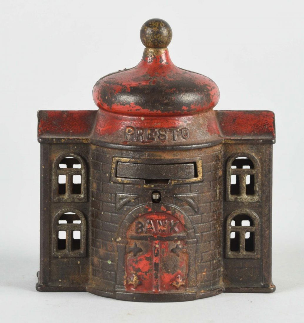 Cast Iron Presto Mechanical Bank. (1 of 1)