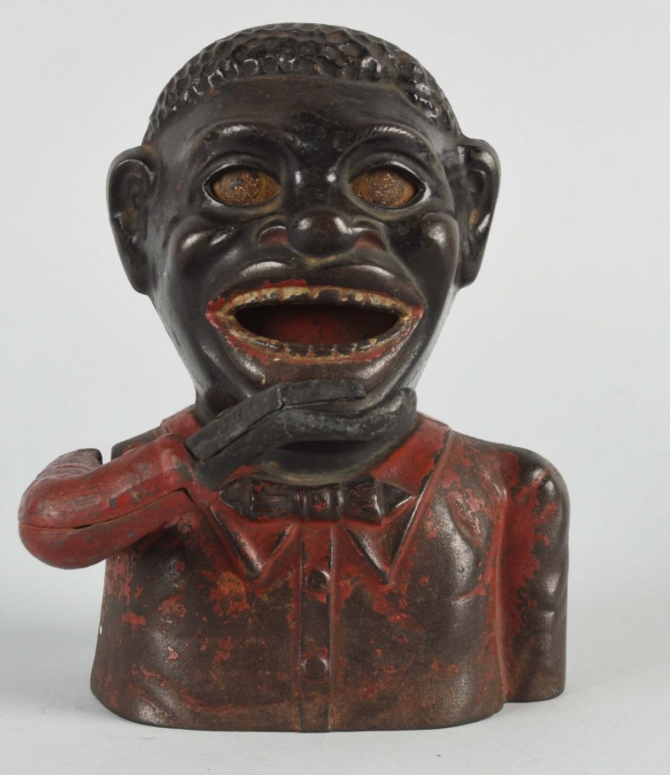 Cast Iron Jolly N Mechanical Bank. (1 of 2)