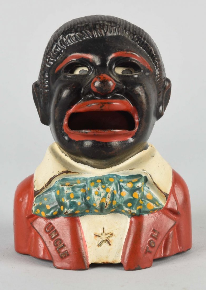 Cast Iron Uncle Tom Mechanical Bank. (1 of 2)