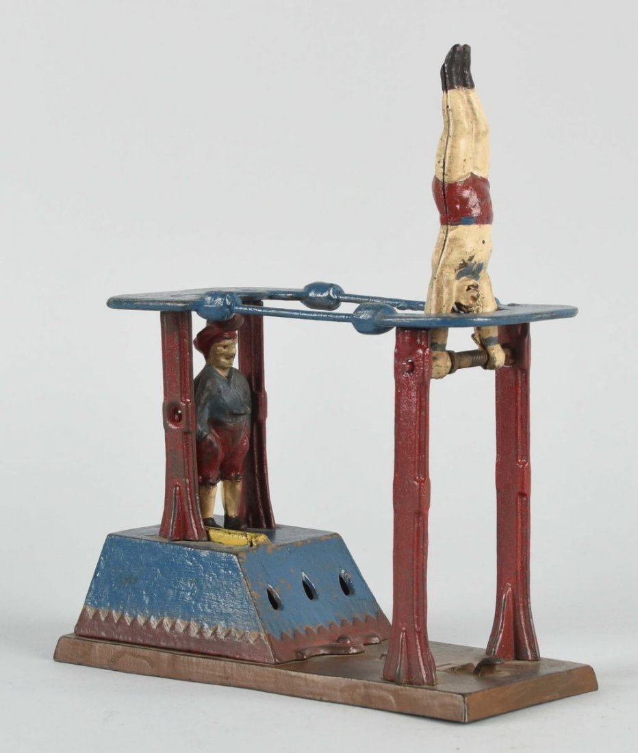 Cast Iron Acrobat Mechanical Bank. (1 of 2)