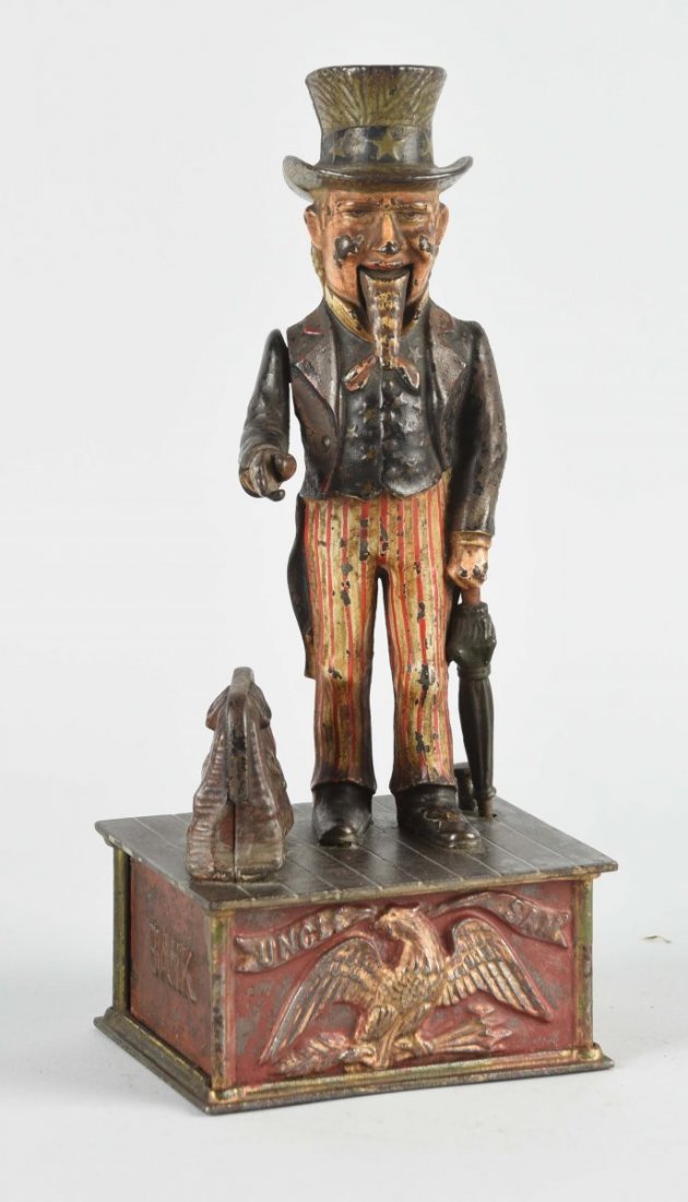 Cast Iron Uncle Sam Mechanical Bank. (1 of 2)
