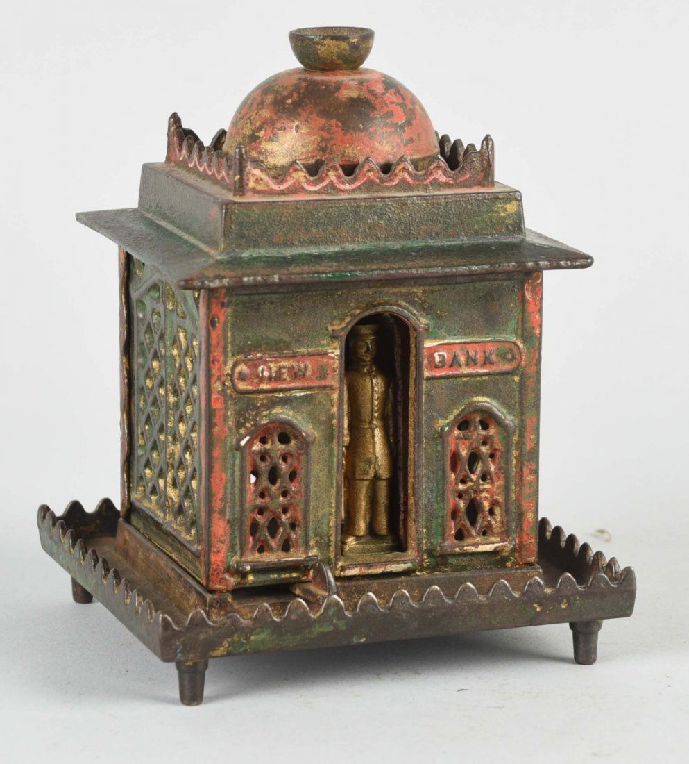 Cast Iron New Bank Mechanical Bank. (1 of 2)