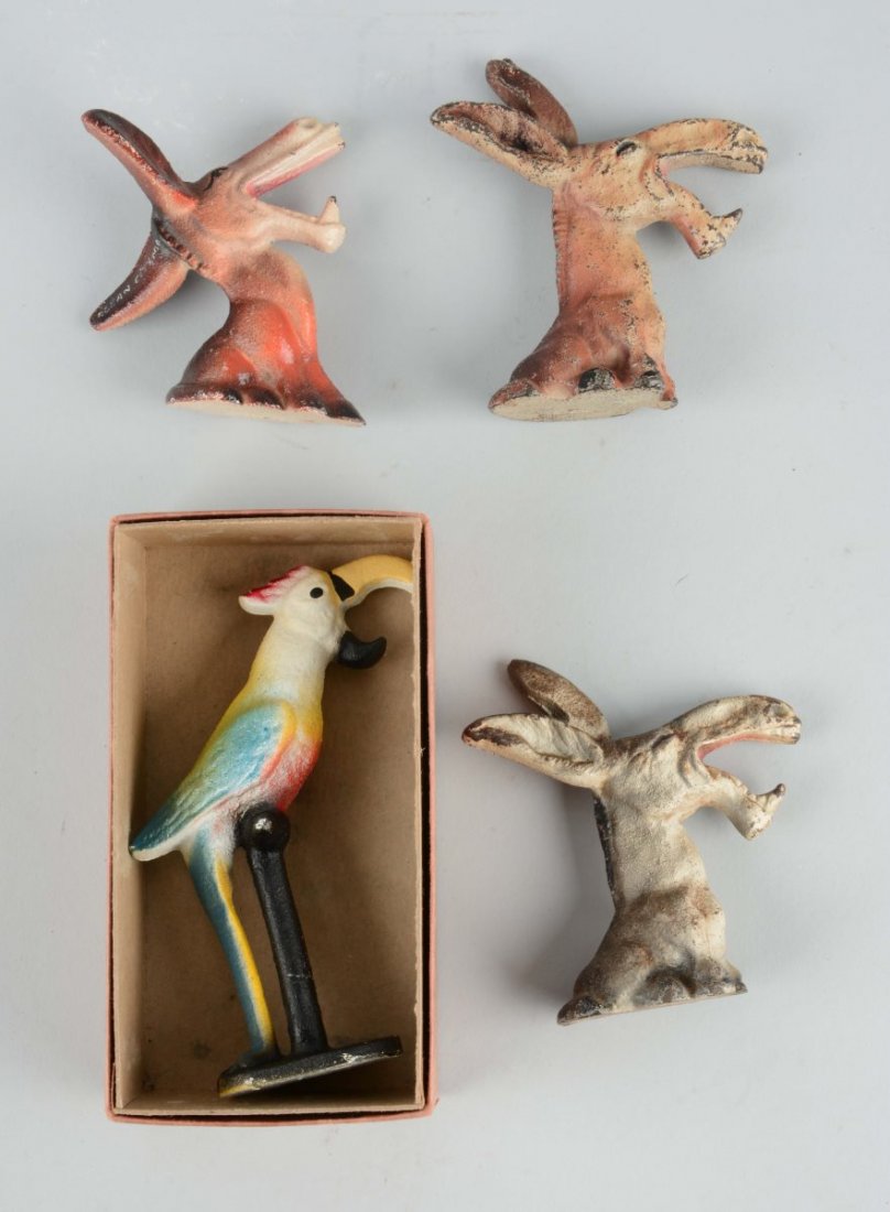 Lot of 4: Cast Iron Figural Bottle Openers. (1 of 2)