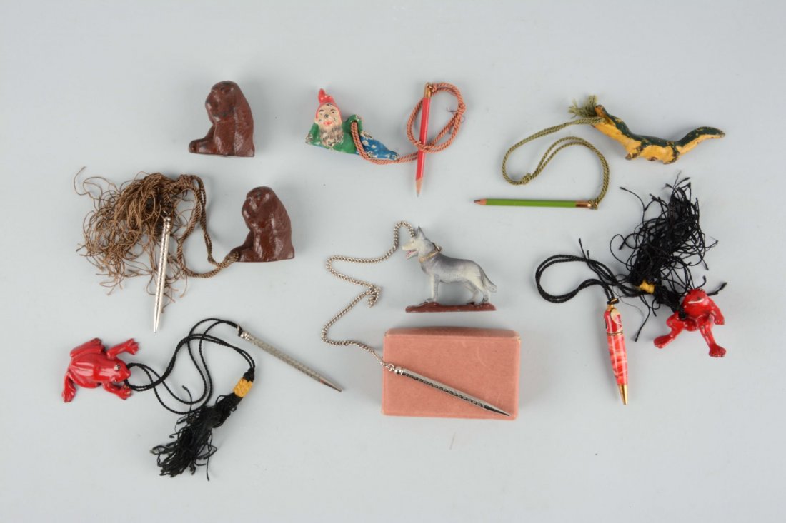 Lot of 7: Cast Iron Figural Pencil Holders. (1 of 1)