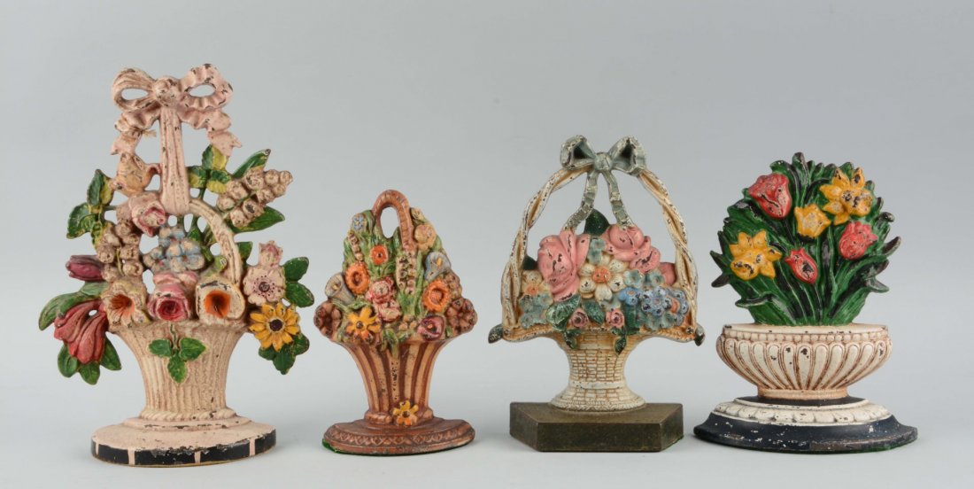 Lot of 4: Cast Iron Assorted Flower Doorstops.: Hubley, Creations, etc. Condition (Good). Size Largest: 10-1/2'' T.