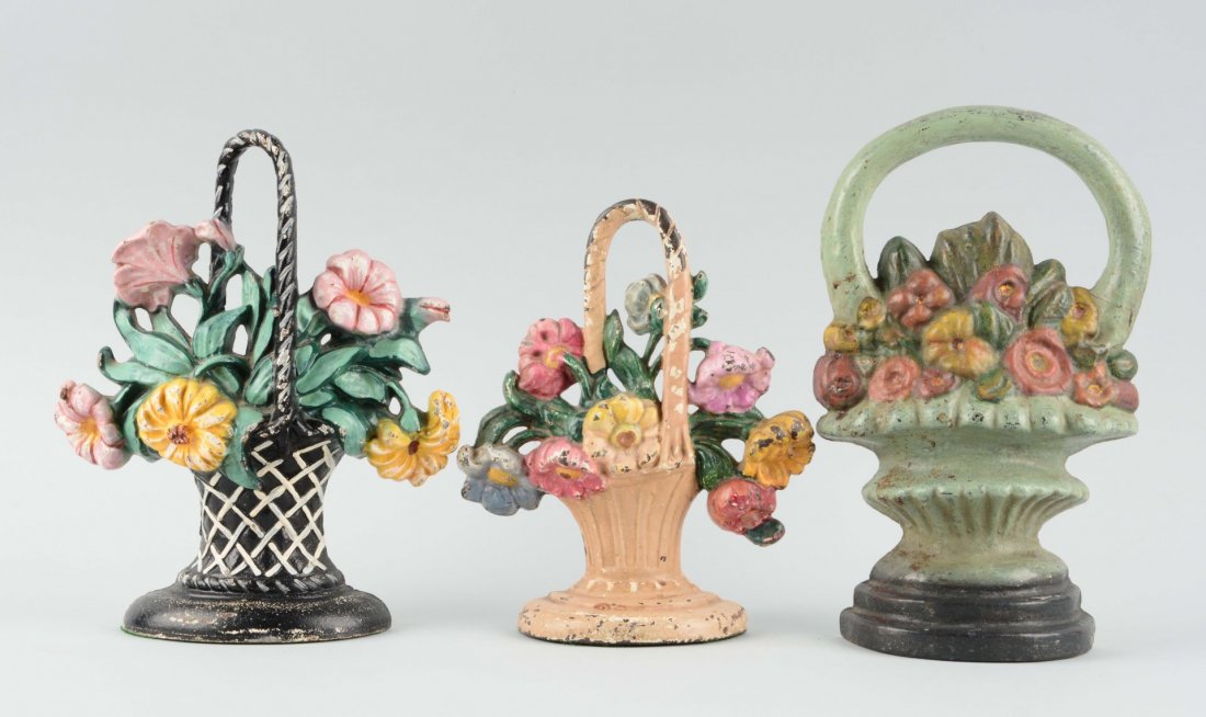 Lot of 3: Cast Iron Flower Doorstops.: Hubley and Albany Foundry. Condition (Very Good). Size Largest: 10-1/2'' T.