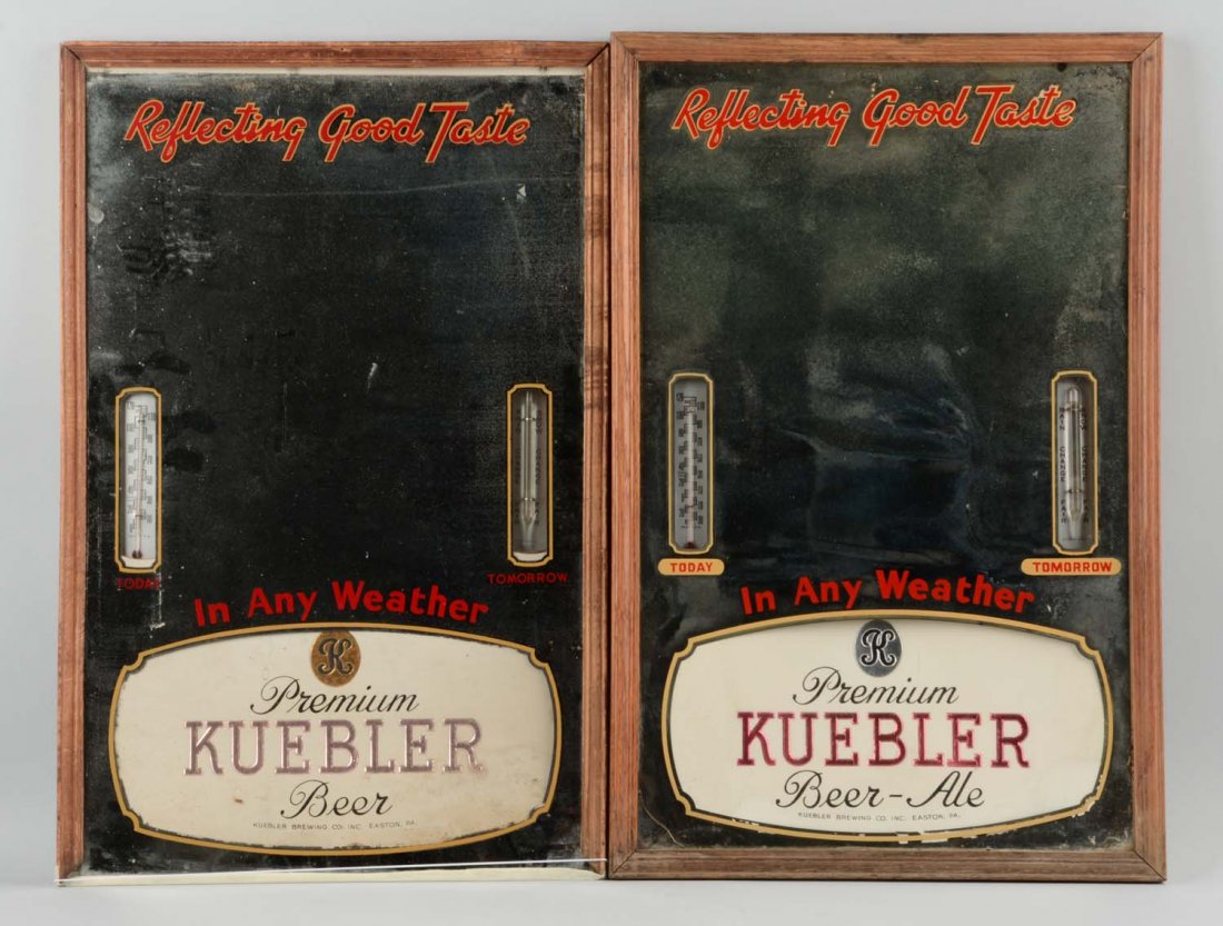 Lot of 2: Kuebler's Beer Mirrors with Thermometers: Have some lifting on glass and paper. Second mirror is missing the bottom piece of the frame. Condition (Very Good). Size Each: 23'' x 15''.