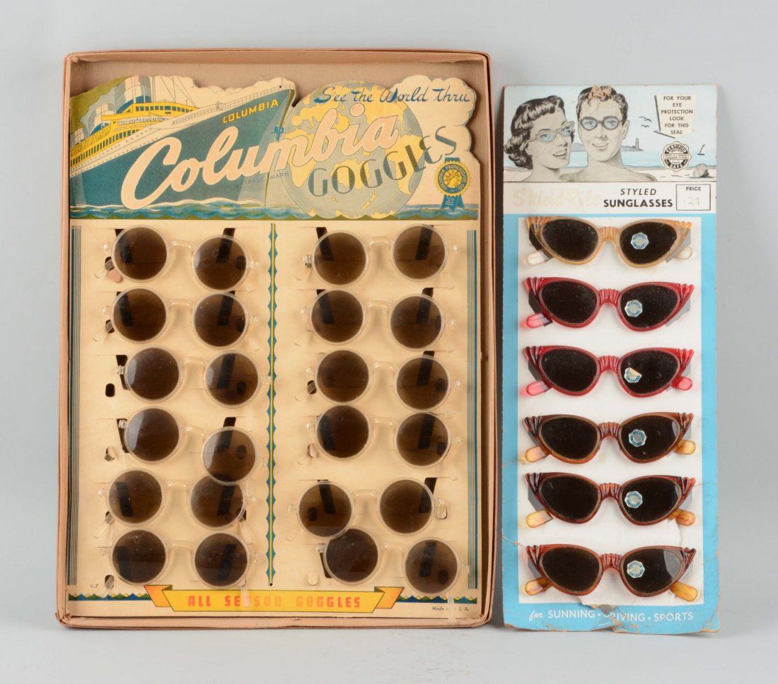 Lot of 2: Goggle & Sunglass Displays.: This lot includes a new old stock display of sunglasses that has some tearing to the cardboard holder on the bottom. The other display is for Columbia Goggles. It is in very good condition with new ol