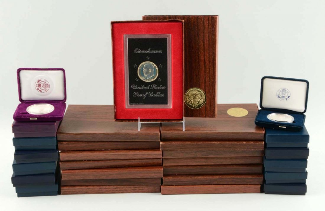 Lot of 11 U.S. Silver Eagles & 15 Ike Dollar. (1 of 1)