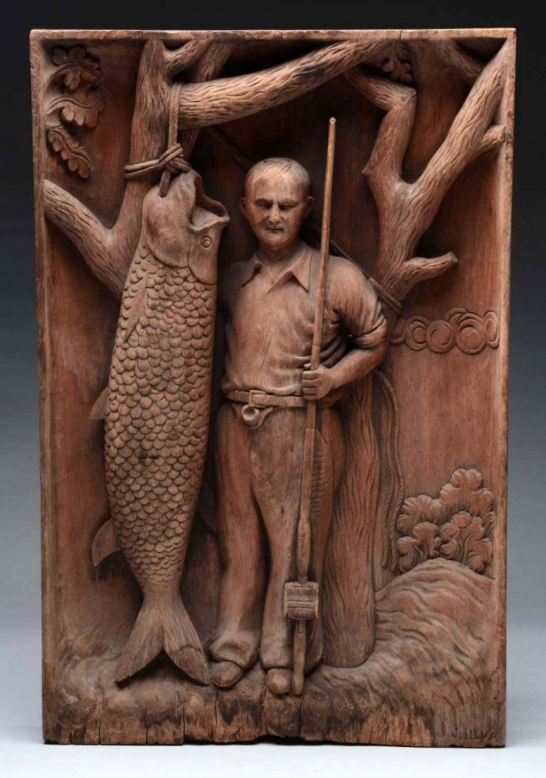Handcarved Wooden Man with Fish. (1 of 1)