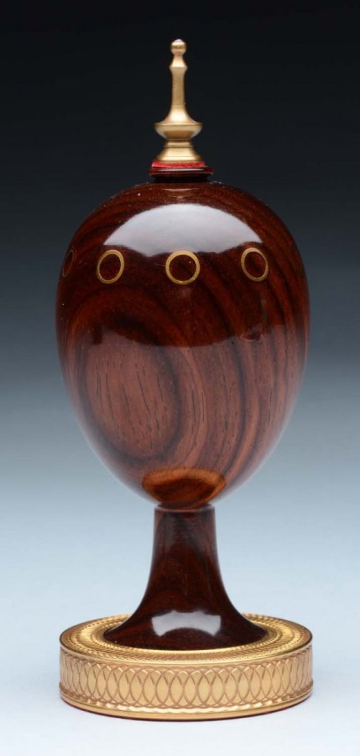 Wooden Faberge Egg.: Number 114, made in England. With pen. Condition (Excellent). Size 4-3/4'' T.