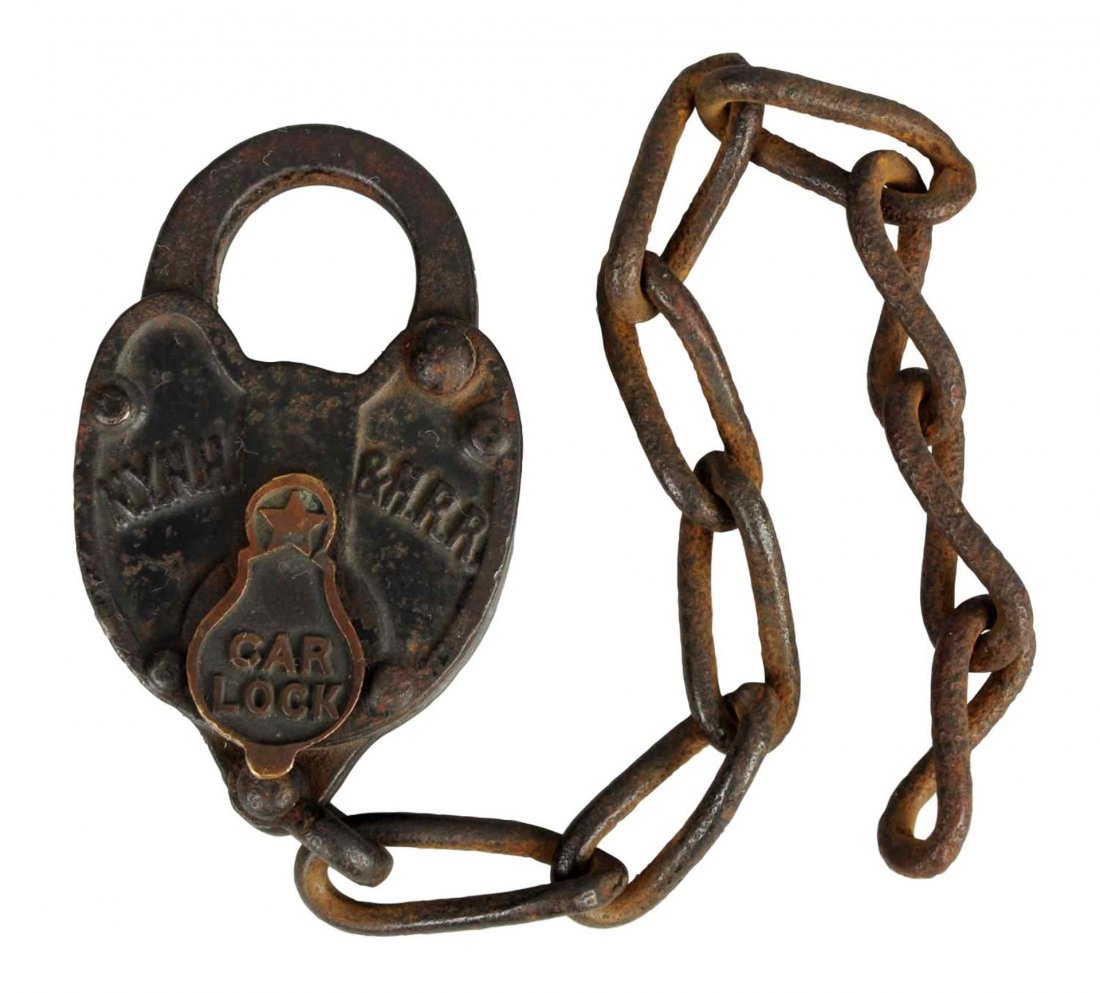 N.Y.N.H. & H.R.R. Car Lock.: This is a very early car lock made for the New York, New Haven & Hartford Railroad Company. Still has the chain attached. Some oxidation and soiling. Nice example. Condition (Very Good). Size 4'' L.