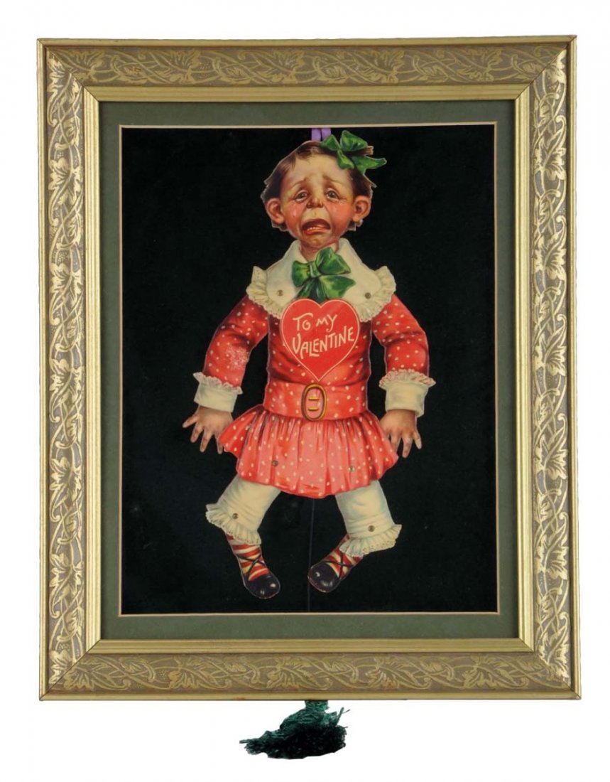 Oversized Mechanical Diecut Valentines.: This piece is shadow box framed. The String comes out the bottom of the frame and when pulled, it moves the valentine’s arms and legs. It is very well made and works well. There is a repair to the n