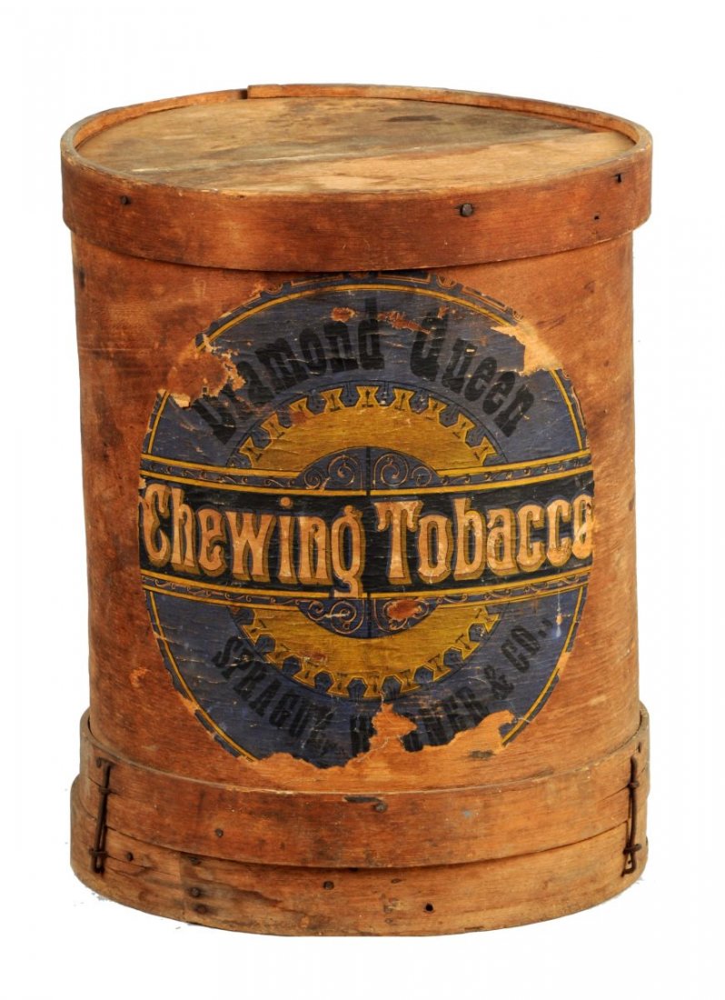 Diamond Queen Chewing Tobacco Barrel.: 1880's tax stamp remnant, 10lb round wood store container with paper label (shows wear), double bottom wood ring. Manufactured by Spaulding and Merrick, Chicago. Condition (Excellent). Size 14" T.