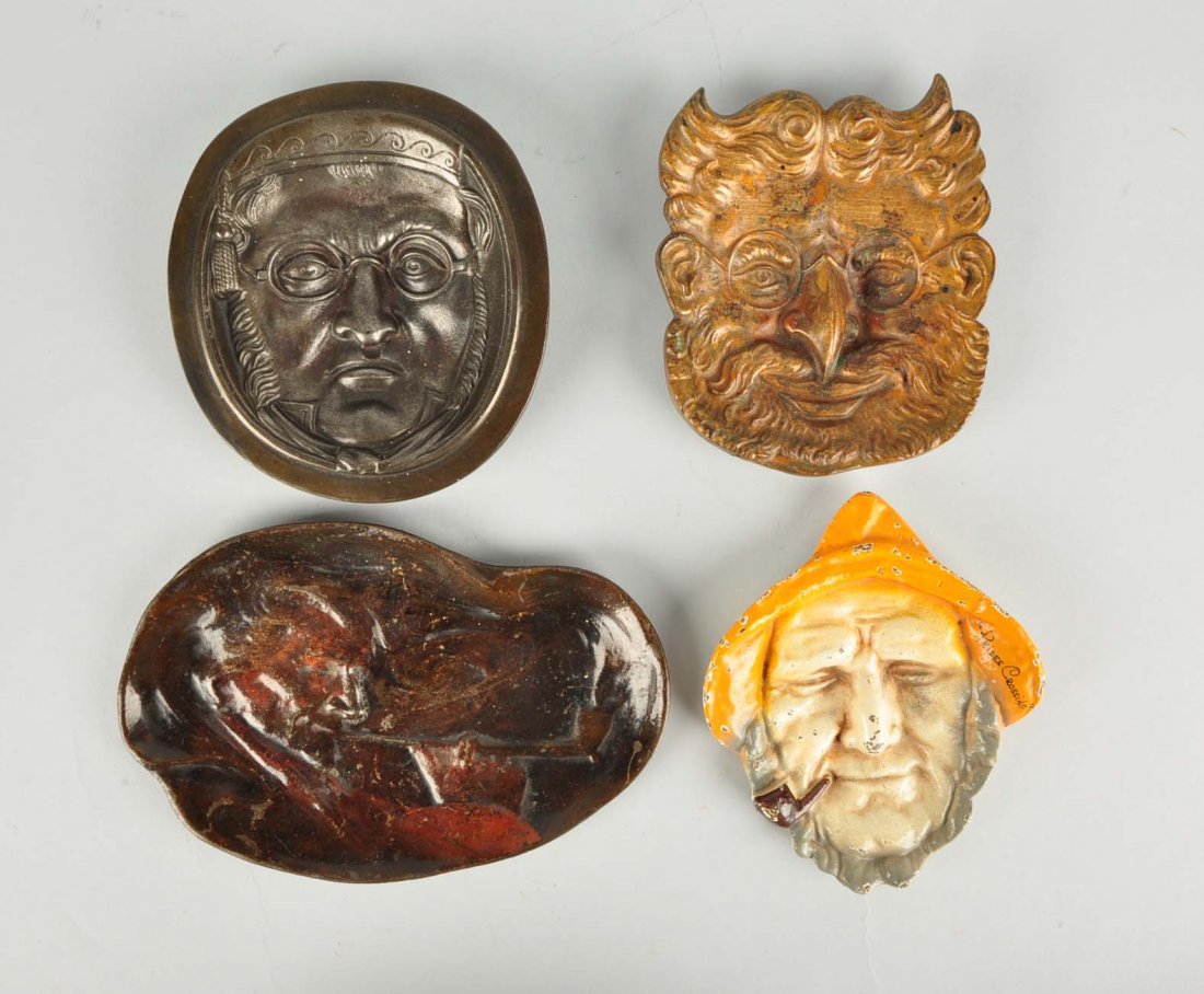 Lot Of 4: Cast Iron Assorted Figural Trays.: Including Man Smoking Pipe, made by B&H; Whale, made by John Wright; etc.