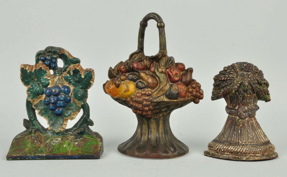 Lot of 3: Cast Iron Assorted Doorstops.: Albany Foundry, etc. Includes Fruit Basket, Grapes, and Sheath of Wheat.