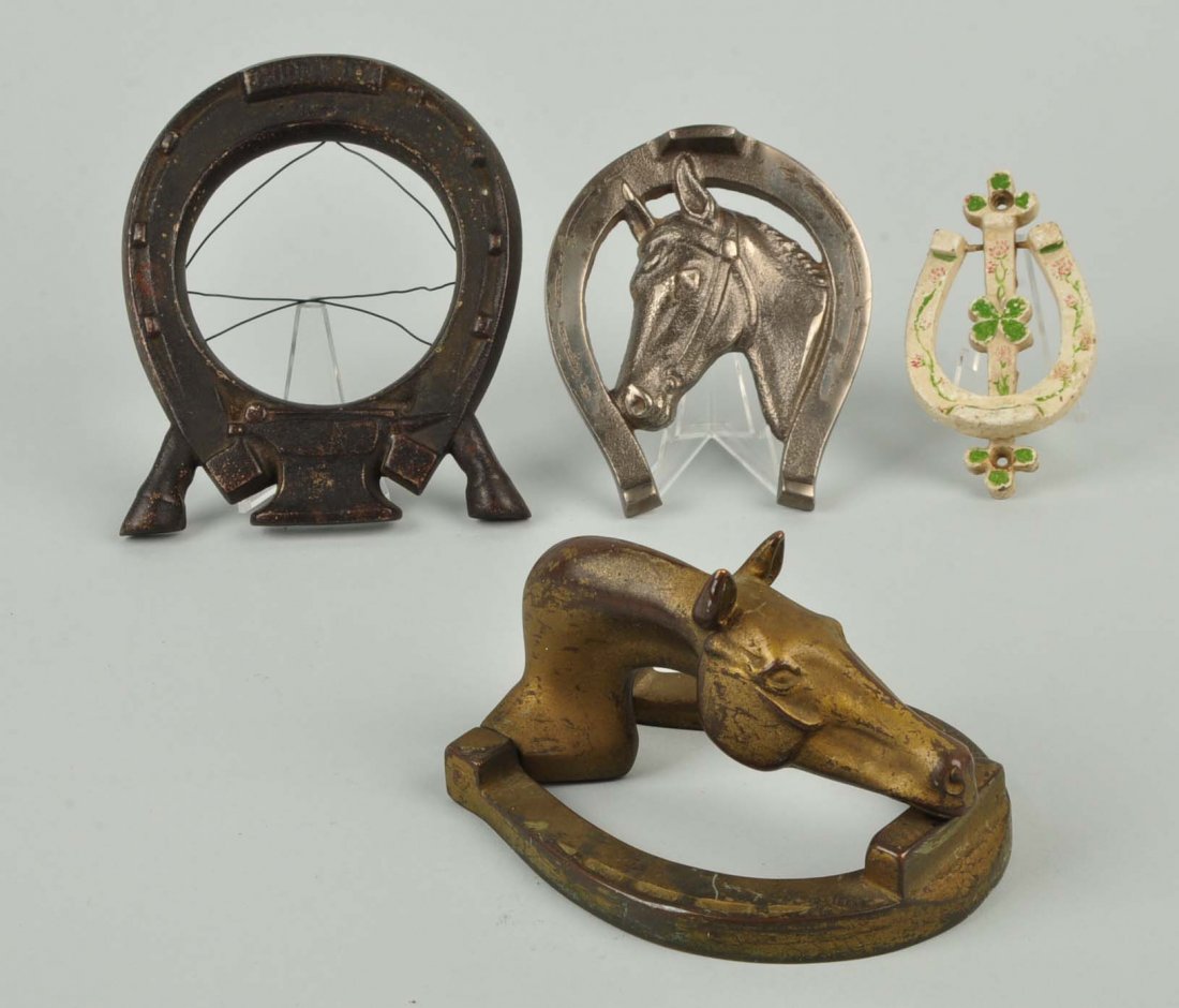 Lot Of 4: Cast Iron Horseshoe Doorknockers.: Lot Of 4: Cast Iron Horseshoe Doorknockers.