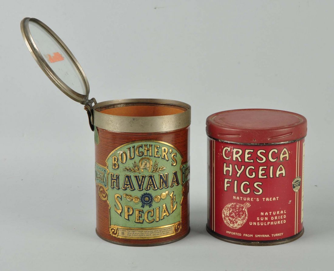 Lot of 2: Havana Cigars & Cresca Hygeia Figs Tins.: This lot consists of two tin cans, one for Bougher’s Special Havana Cigars and the other for Cresca Hygeia Figs. The Havana cigars can’s lid swings open with a clear top. This can was constructed