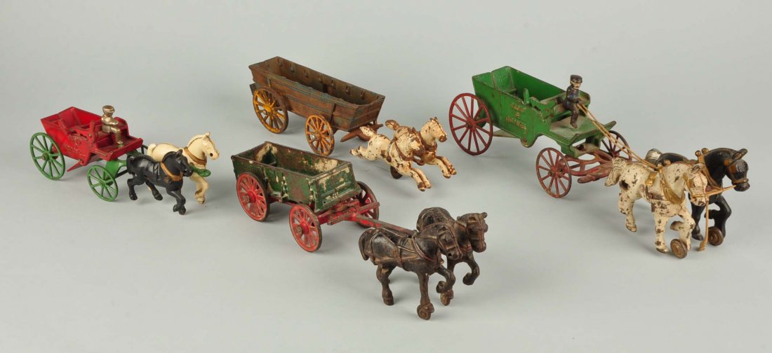 Lot Of 4: Cast Iron Horse Drawn Wagons. (1 of 5)