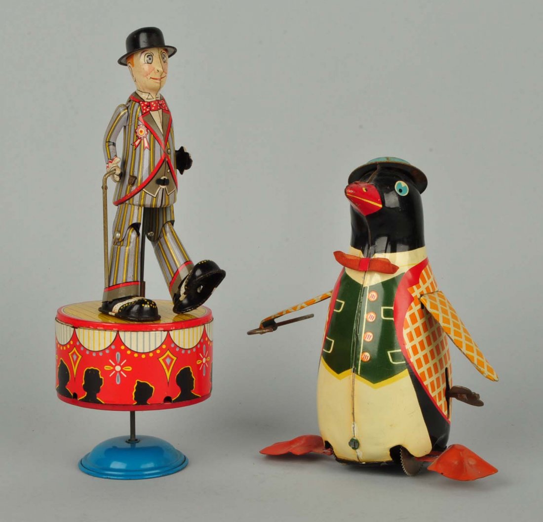 Lot Of 2: Tin Litho Wind-Up Toys. (1 of 2)