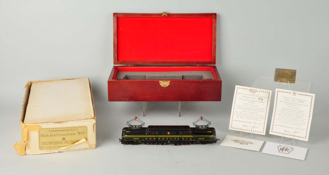 AHM Commemorative GG-1 PRR Black Jack #4935.: Locomotive is in like new condition. Comes with a COA and all the paperwork. Housed in a wooden box with red velvet lining. Original shipping box is worn with tears and tape repairs.