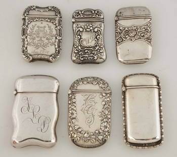 Lot Of 6: Sterling Silver March Safes.: Three are made by Simon Brothers, two by Palmer & Peckham and the last by Herbst & Wassall. Four have a floral design and three have initials.