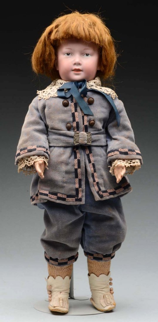 Rare A.M. Character Doll.: Seldom found German bisque head incised "Germany A 5 M" (two cracks on forehead, broken and glued pieces on back of head with some fill in, facial features not affected) light tapered eyebrows, blue i