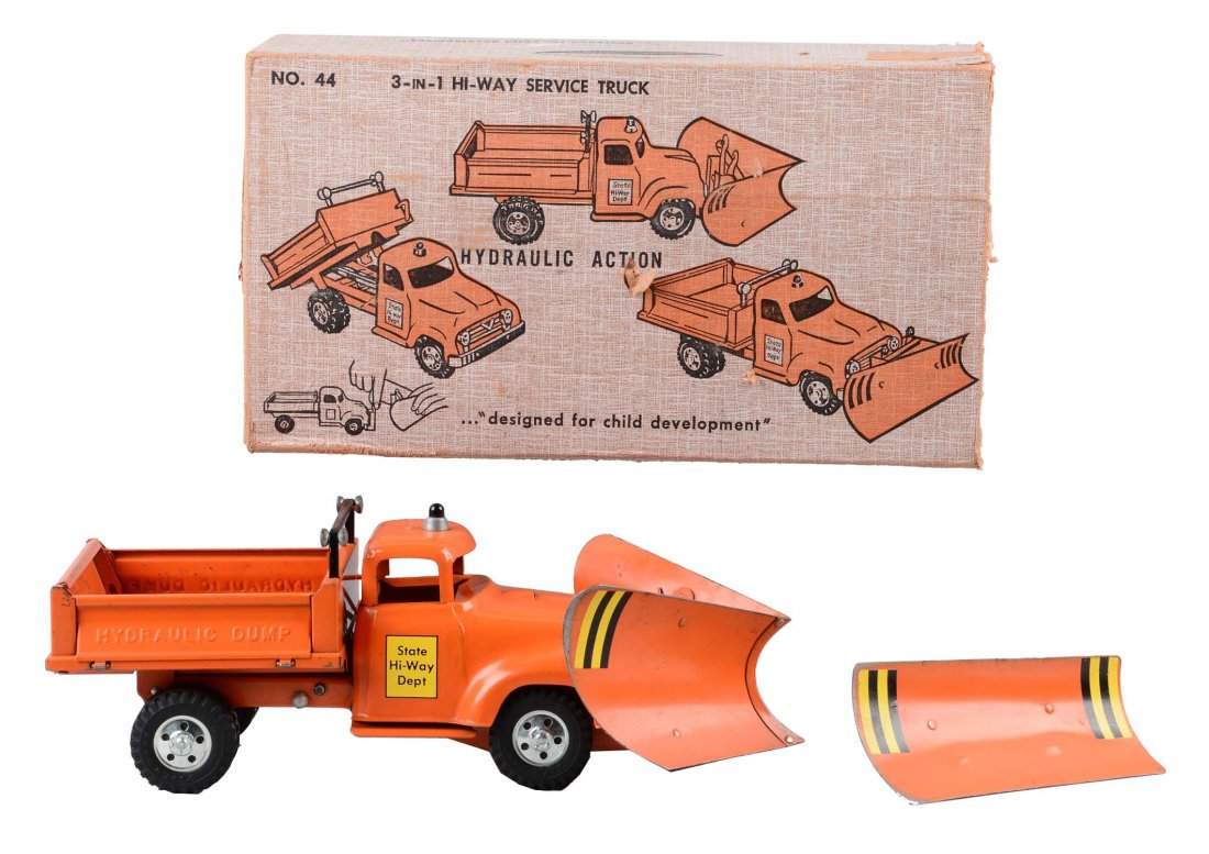 Tonka Three in One Highway Service Truck No. 44.: Circa 1957. Both the double blade plow and the single blade plow have some scratches and paint chips throughout, in very good condition. The truck, complete and all original, with scratches and paint
