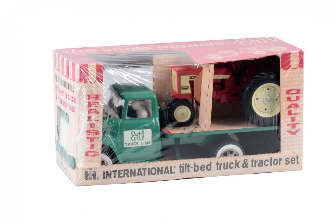 Ertl International Tilt Bed w/ a Farmall Tractor. (1 of 3)